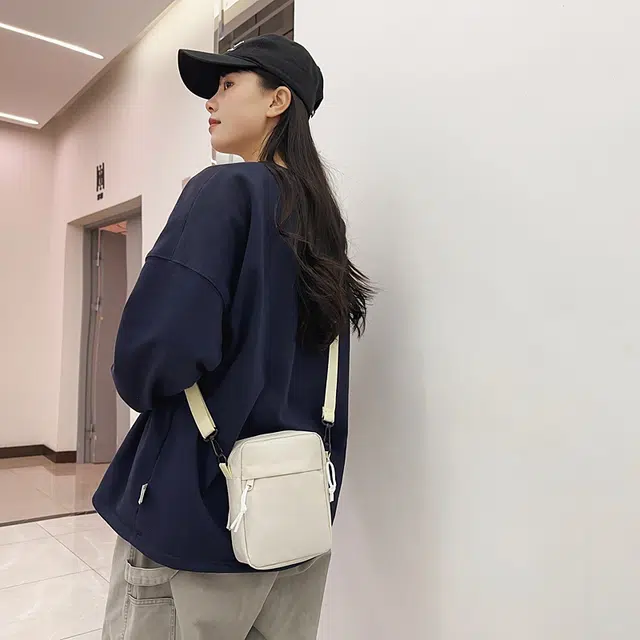 德力熊 休闲便携 牛津布 斜挎包单肩包 常规 男女同款情侣款 多色