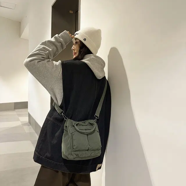 德力熊 大容量日系复古通勤拉链开合 帆布 单肩包 常规 男女同款情侣款 黑/白/绿/棕