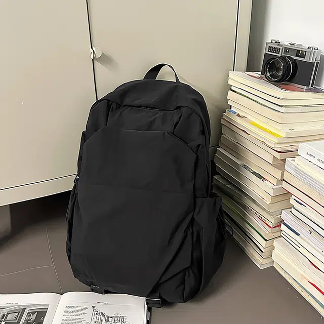 德力熊 纯色简约大容量轻便百搭 尼龙 双肩包 常规 男女同款情侣款 黑色/灰色/棕色/绿色