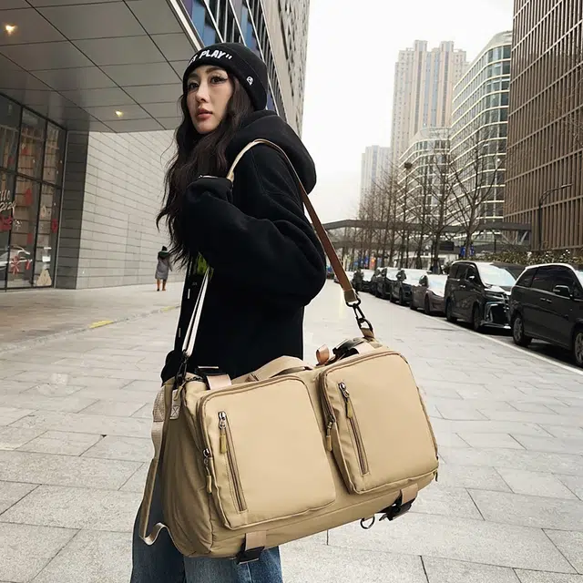 德力熊背包男女通用双色单肩包青年商务多用双肩单肩斜挎手提包休闲大容量短途旅行包牛皮多色尼龙