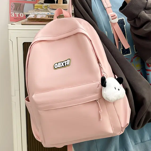 德力熊  尼龙男女通用多色高颜值学生书包纯色大容量双肩包尼龙简约百搭小众背包