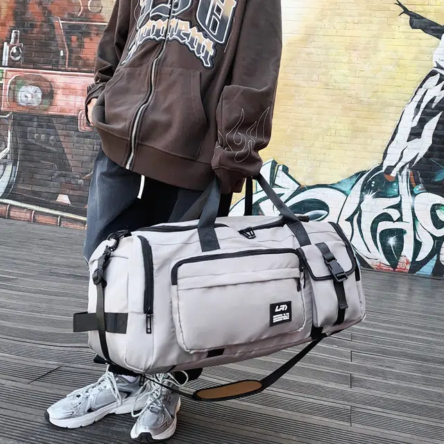 德力熊 大容量轻便多功能 尼龙 斜挎旅行包 常规 男女同款情侣款 灰色/黑色/绿色