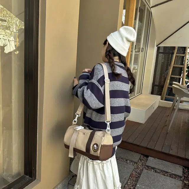 德力熊尼龙女生多色拼色单肩包手提包运动休闲斜挎健身包包大容量旅行背包