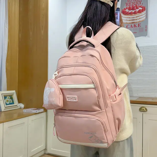 泰克森 纯色简约刺绣字母休闲拼接 尼龙 双肩包 常规 男女同款情侣款 黑色/蓝色/粉色/绿色/紫色
