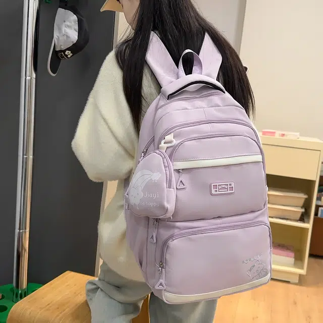 泰克森 纯色简约刺绣字母休闲拼接 尼龙 双肩包 常规 男女同款情侣款 黑色/蓝色/粉色/绿色/紫色