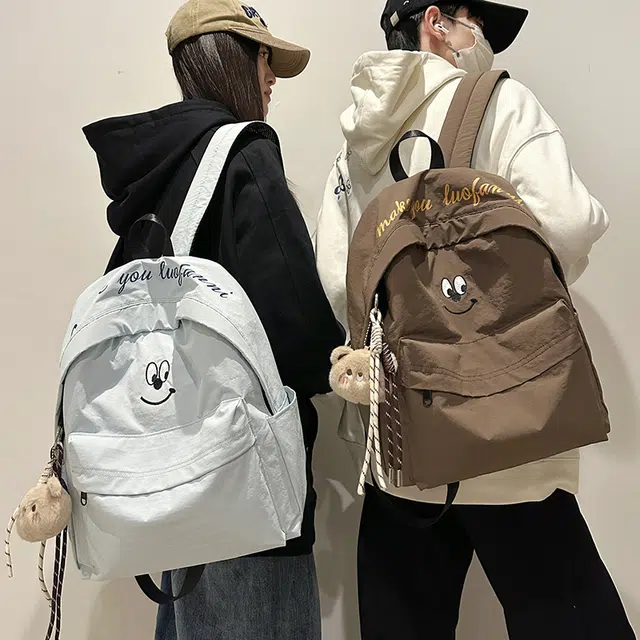 泰克森 休闲 百搭 尼龙 双肩包 常规 男女同款情侣款 米白色/黑色/咖啡色/天蓝色