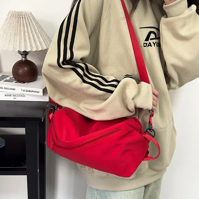 泰克森 时尚潮流白搭 尼龙 胸包 常规 男女同款情侣款 米白色/灰色/黑色/红色/桔色/卡其色