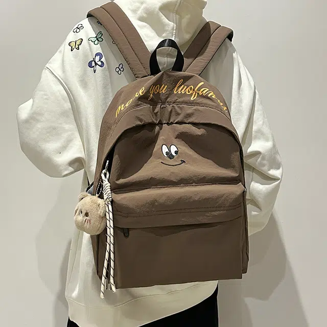 泰克森 休闲 百搭 尼龙 双肩包 常规 男女同款情侣款 米白色/黑色/咖啡色/天蓝色