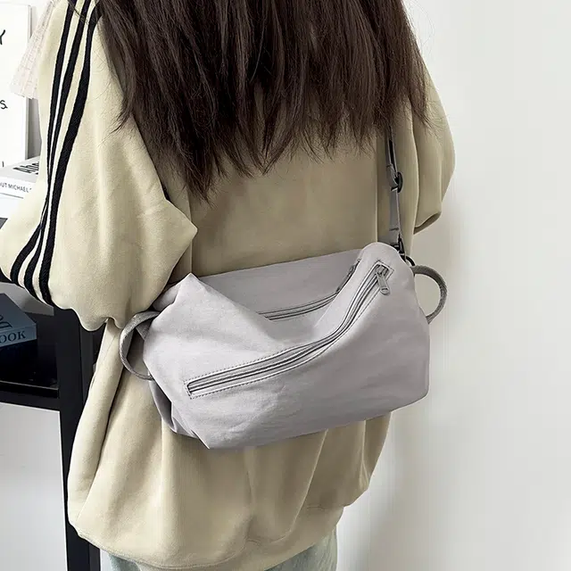 泰克森 时尚潮流白搭 尼龙 胸包 常规 男女同款情侣款 米白色/灰色/黑色/红色/桔色/卡其色
