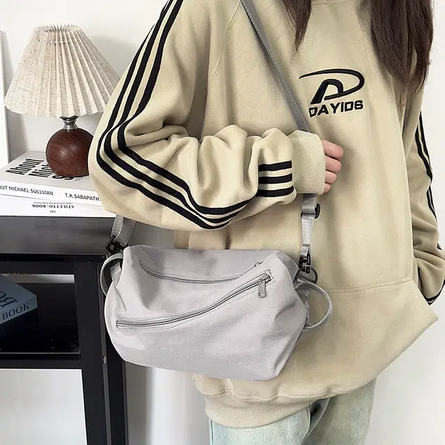 泰克森 时尚潮流白搭 尼龙 胸包 常规 男女同款情侣款 米白色/灰色/黑色/红色/桔色/卡其色
