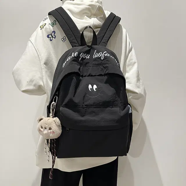 泰克森 休闲 百搭 尼龙 双肩包 常规 男女同款情侣款 米白色/黑色/咖啡色/天蓝色
