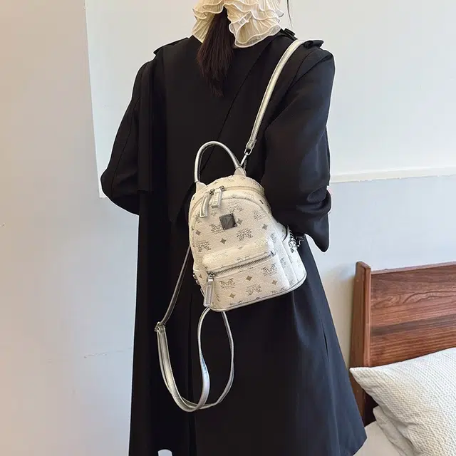 泰克森 时尚简约休闲背包出行 棉纶 双肩包 常规 男女同款情侣款 白色/黑色/咖啡色