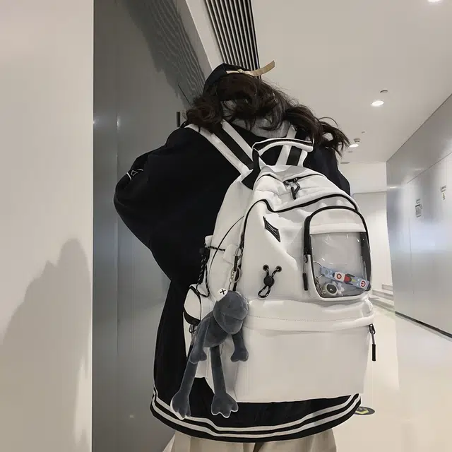 泰克森 大容量简约出行背包 尼龙 双肩包 男女同款情侣款 白色/黑色