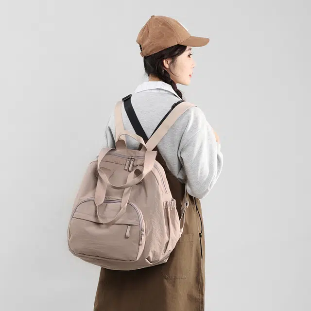 泰克森 潮流 百搭 休闲 尼龙 双肩包 女款 黑色/粉红色/紫色/卡其色/浅绿色/浅蓝色/土绿色/田园黄