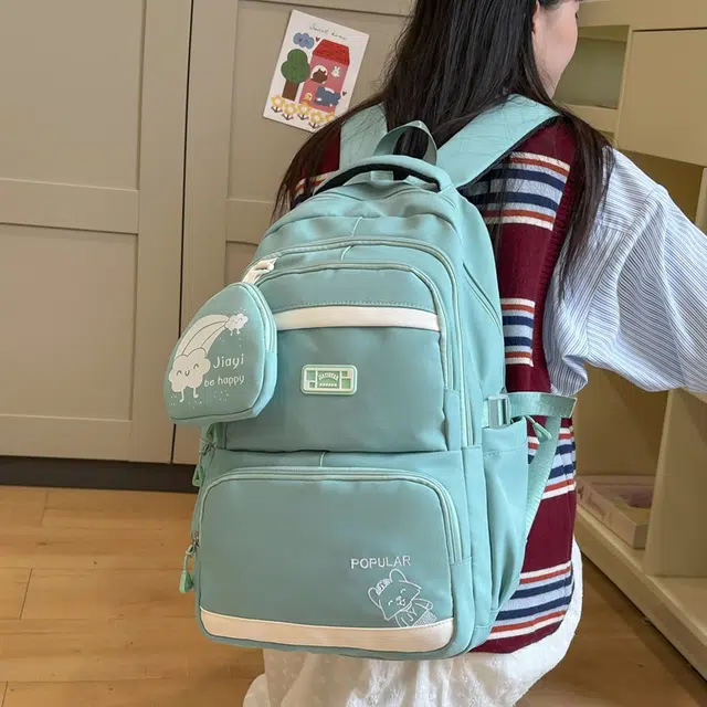 泰克森 纯色简约刺绣字母休闲拼接 尼龙 双肩包 常规 男女同款情侣款 黑色/蓝色/粉色/绿色/紫色