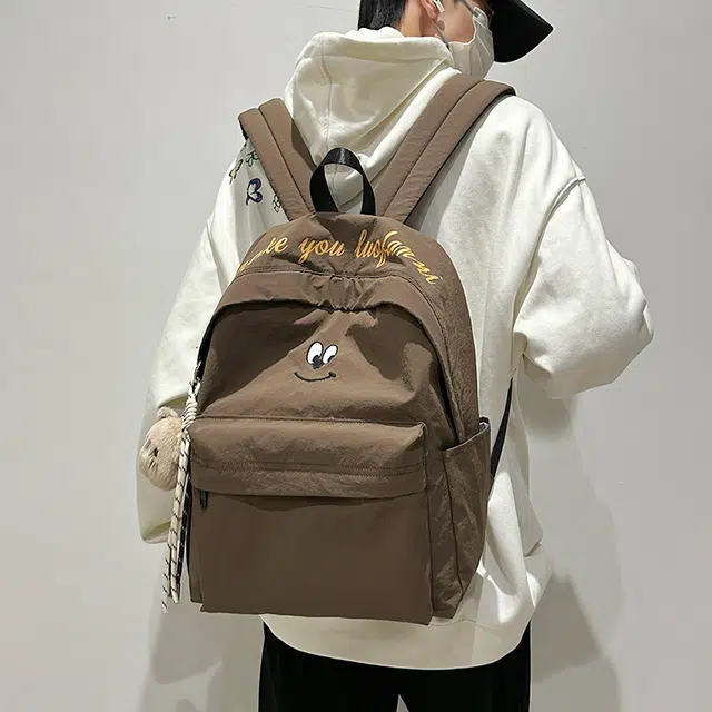 泰克森 休闲 百搭 尼龙 双肩包 常规 男女同款情侣款 米白色/黑色/咖啡色/天蓝色
