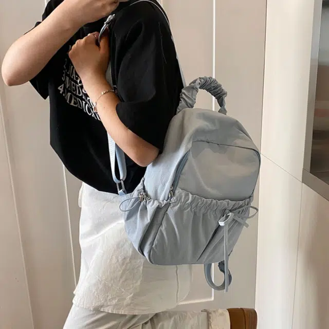 泰克森 时尚可爱休闲简约背包 牛津纺 双肩包 常规 男女同款情侣款 米白色/黑色/红色/蓝色/粉色