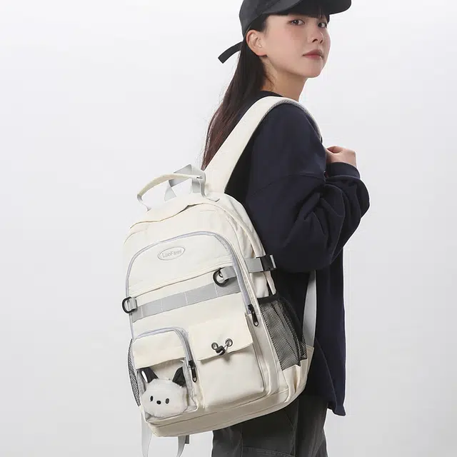 泰克森 大容量潮流百搭 尼龙 双肩包 男女同款情侣款 米白色/黑色/紫色/湖蓝色