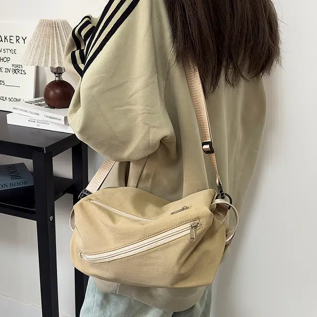 泰克森 时尚潮流白搭 尼龙 胸包 常规 男女同款情侣款 米白色/灰色/黑色/红色/桔色/卡其色