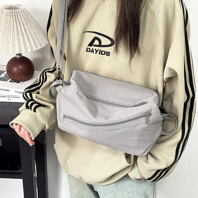 泰克森 时尚潮流白搭 尼龙 胸包 常规 男女同款情侣款 米白色/灰色/黑色/红色/桔色/卡其色