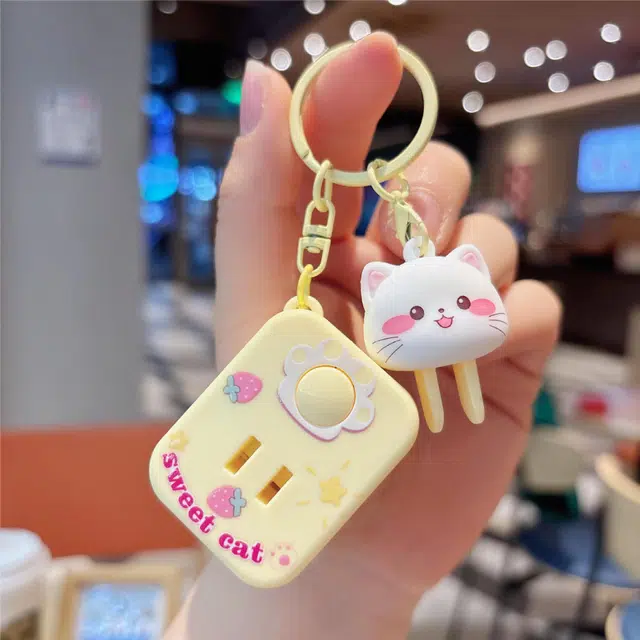 祎步康 卡通创意趣味猫咪音乐插座钥匙扣解压可爱青蛙包包小 塑料 挂件 男女同款情侣款