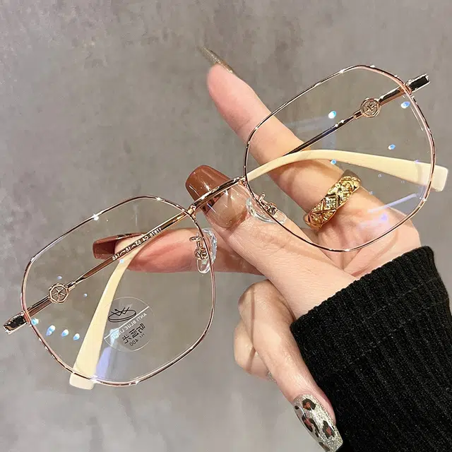优幽兰 氛围感小众设计感高级感斯文显脸小显白简约 金属 不规则形 太阳眼镜 女款