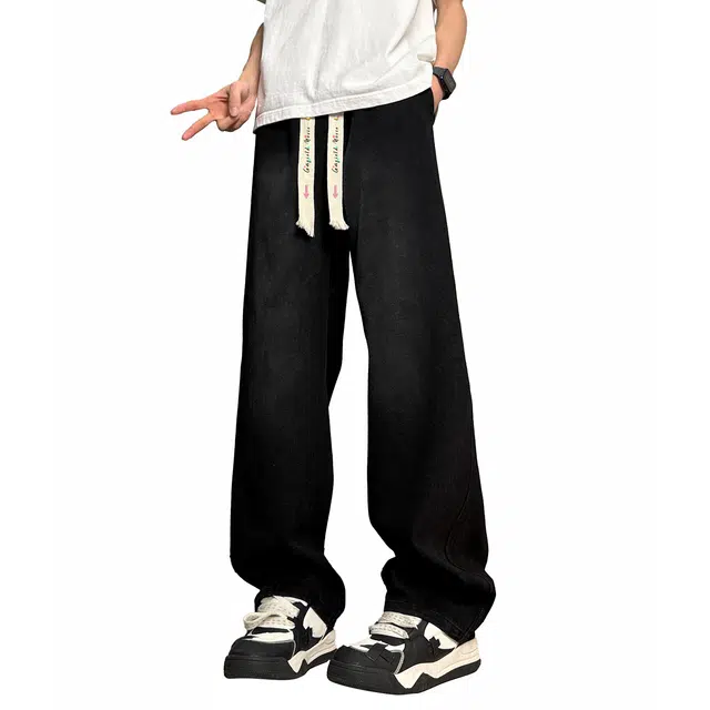 加菲猫家族 纯色基础复古风水洗做旧宽松直筒垂感柔软舒适透气系带印花设计日常通勤百搭街头个性酷帅中腰牛仔裤 男女同款