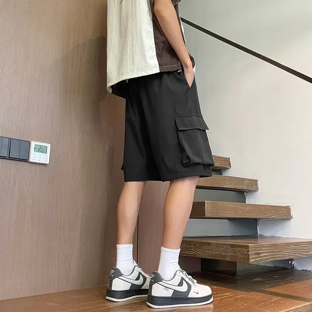 加菲猫家族 美式简约纯色基础宽松舒适大口袋烧花设计时尚潮流街头酷帅五分直筒垂感轻薄透气排汗系带中腰工装短裤 男女同款