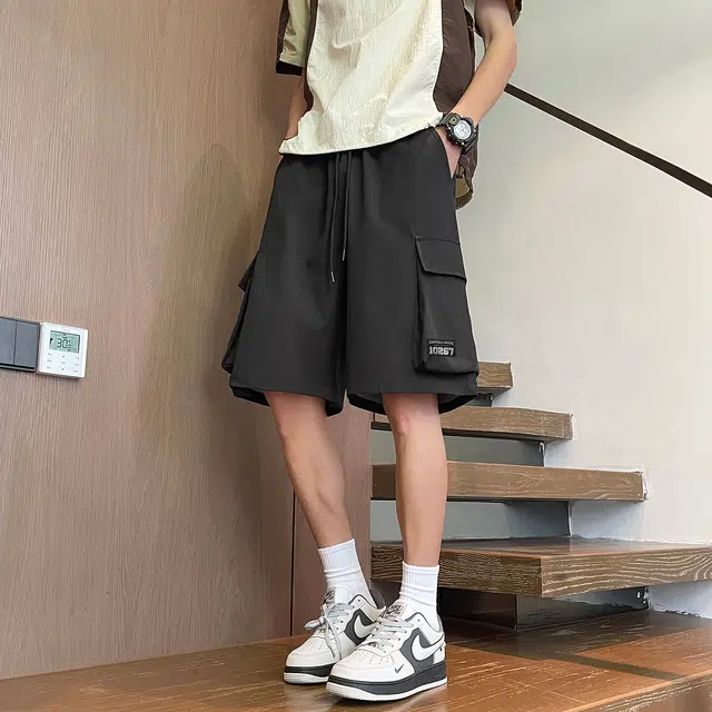 加菲猫家族 美式简约纯色基础宽松舒适大口袋烧花设计时尚潮流街头酷帅五分直筒垂感轻薄透气排汗系带中腰工装短裤 男女同款