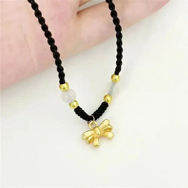 尚银福 在逃公主 国风轻奢简约浪漫光面蝴蝶结圆珠吊坠编织黑绳锁骨链  织物 项链 女款