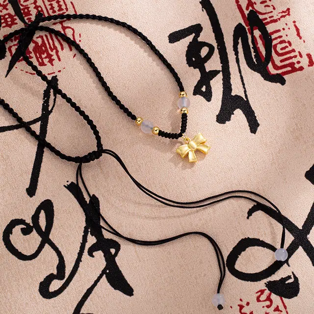 尚银福 在逃公主 冷淡风轻奢 高级感 新中式国潮复古浪漫精致在逃公主光面蝴蝶圆珠 织物 项链 女款