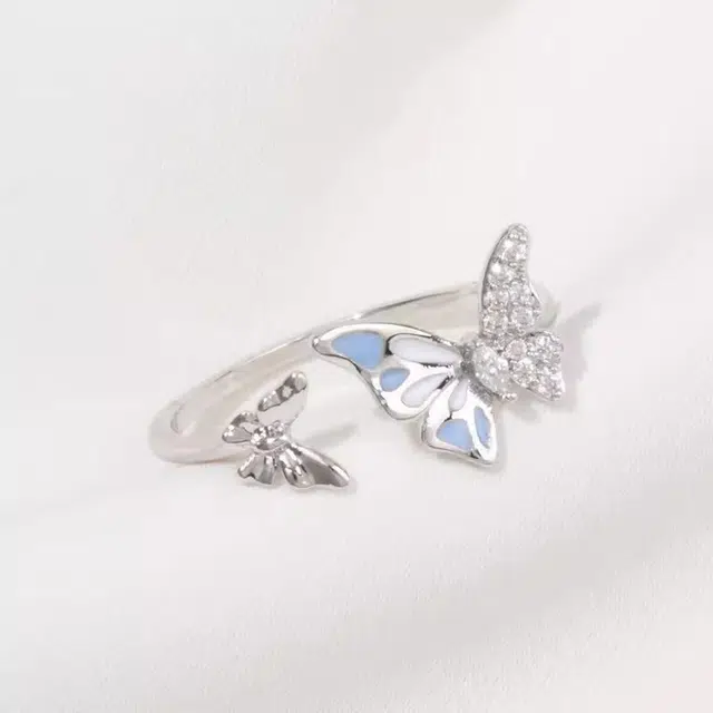 尚银福 蓝韵蝴蝶 轻奢小众高级感 简约精致甜美少女感不对称双蝴蝶缠绕指尖开口可调节指环 合金 戒指 女款