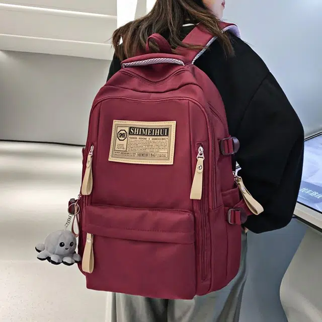 纳兰杜 书包大容量女学生高颜值轻便简约休闲男大学生背包 织物 双肩包电脑旅行包 大号 男女同款情侣款 红色/黑色/卡其色