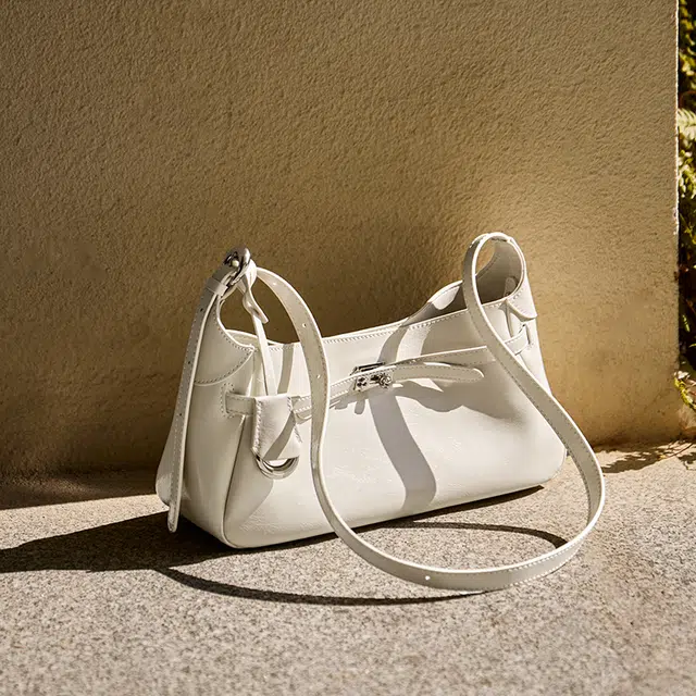 纳兰杜 慵懒松弛感通勤时尚潮流百搭高级感 牛皮拼合成革 腋下单肩包 女款 米白色/黑色