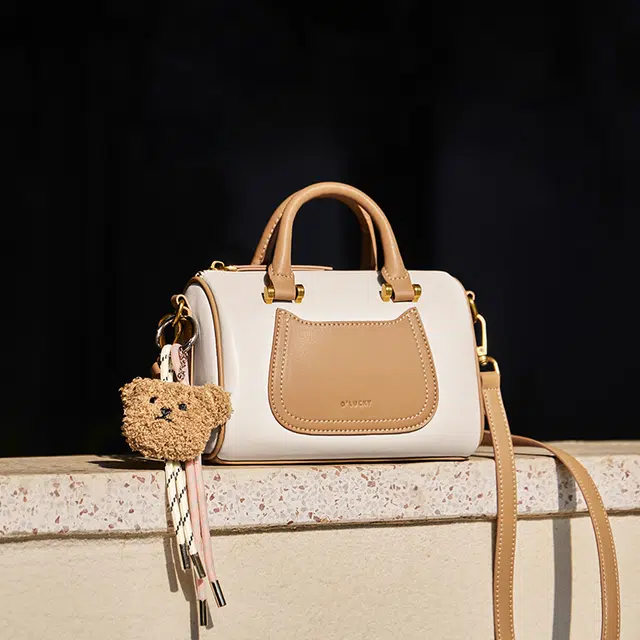 纳兰杜 上班通勤洋气高级感保龄球波士顿包 牛皮 单肩斜挎手提包 小号 女款 米白拼杏/子夜黑