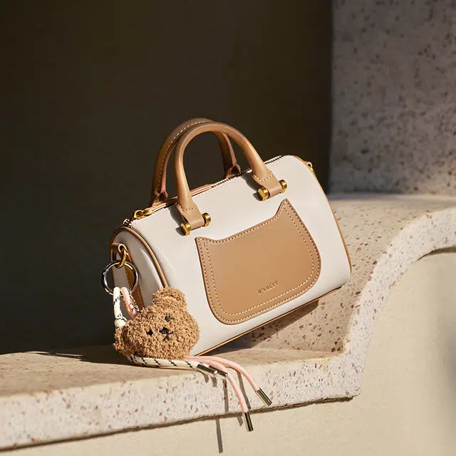 纳兰杜 上班通勤洋气高级感保龄球波士顿包 牛皮 单肩斜挎手提包 小号 女款 米白拼杏/子夜黑