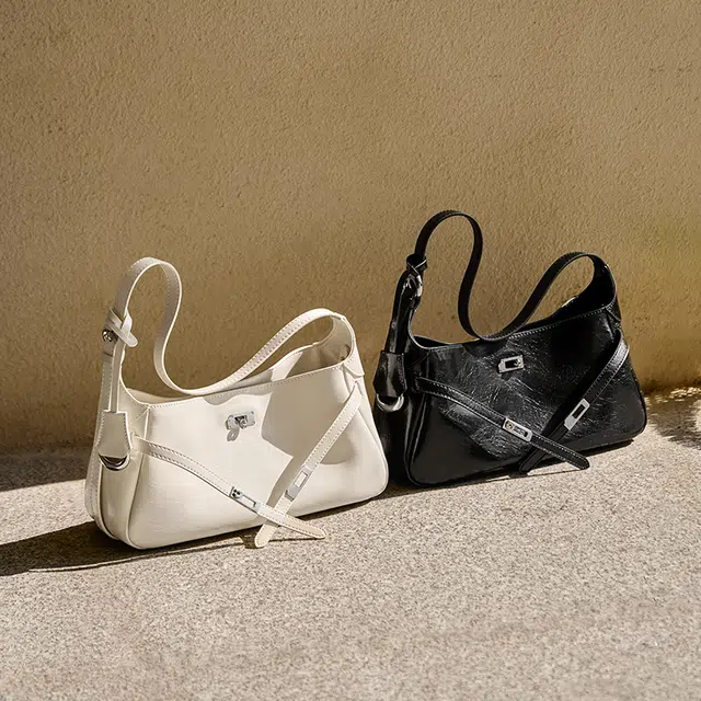 纳兰杜 慵懒松弛感通勤时尚潮流百搭高级感 牛皮拼合成革 腋下单肩包 女款 米白色/黑色