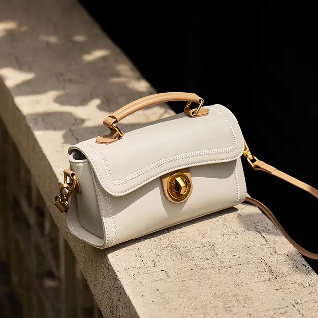 纳兰杜 时尚通勤洋气百搭简约 牛皮拼合成革 单肩手提包 女款 米白拼杏色