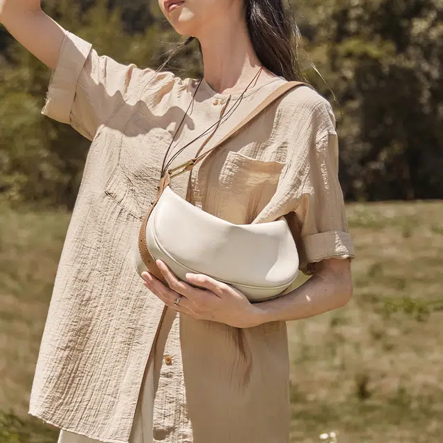 纳兰杜 时尚法式流行休闲百搭小众通勤 牛皮拼合成革 饺子包腋下斜挎包 中号 女款 多色