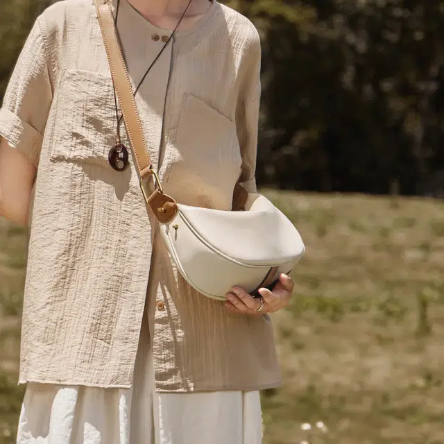 纳兰杜 时尚法式流行休闲百搭小众通勤 牛皮拼合成革 饺子包腋下斜挎包 中号 女款 多色