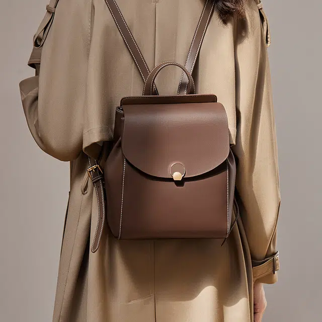 纳兰杜 大容量出行旅游高级感百搭高中生初中生轻便 牛皮拼合成革 背包双肩包 大号 女款 白拼咖色