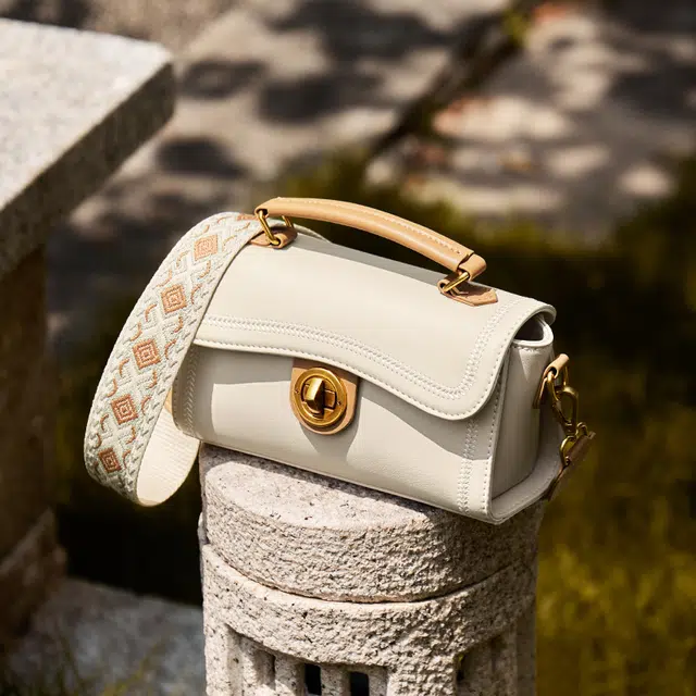 纳兰杜 时尚通勤洋气百搭简约 牛皮拼合成革 单肩手提包 女款 米白拼杏色