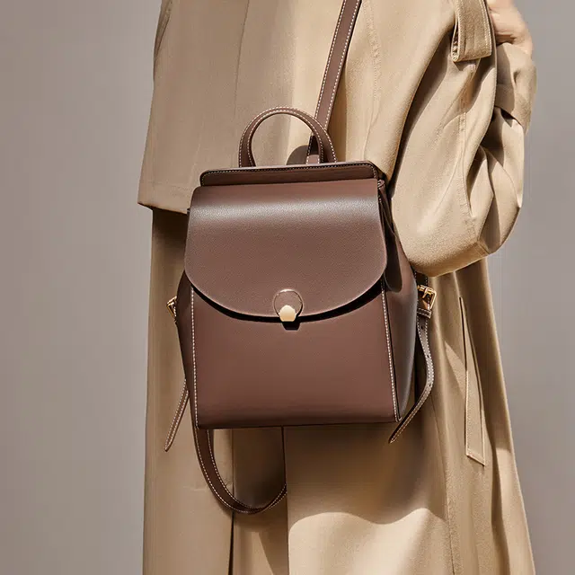 纳兰杜 大容量出行旅游高级感百搭高中生初中生轻便 牛皮拼合成革 背包双肩包 大号 女款 白拼咖色