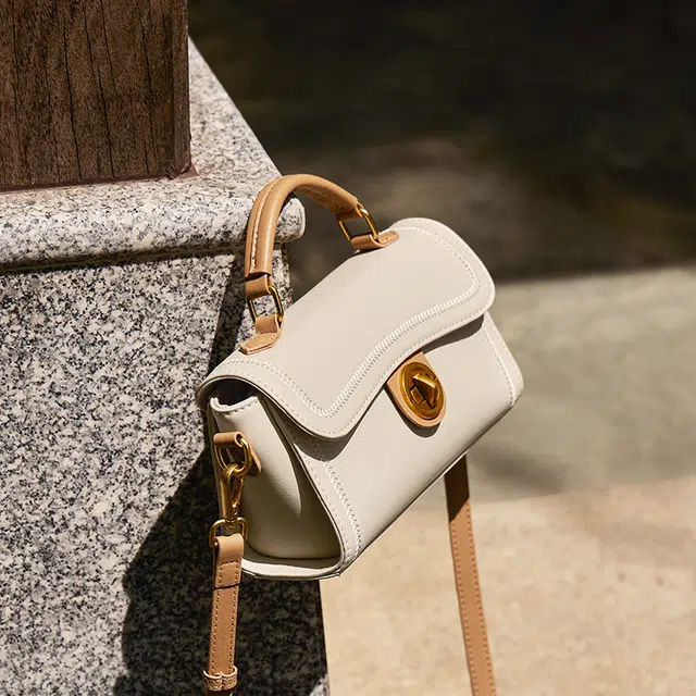 纳兰杜 时尚通勤洋气百搭简约 牛皮拼合成革 单肩手提包 女款 米白拼杏色