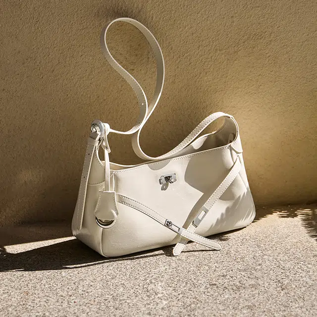 纳兰杜 慵懒松弛感通勤时尚潮流百搭高级感 牛皮拼合成革 腋下单肩包 女款 米白色/黑色