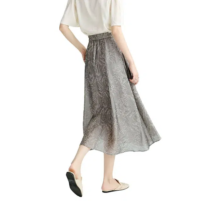 晚白 莱赛尔面料印花大摆半裙隐藏拉链设计有口袋休闲长裙 女款