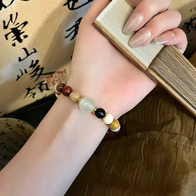郁馨 国风优雅小众设计中式美学单圈禅意手饰多巴胺色彩 本命年转运夜光珠 考研考试上岸#好运 檀木 手串 男女同款情侣款