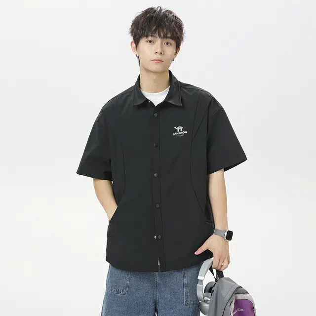 领航骆驼 时尚街头工装纯色简约基础款廓形休闲单排扣透气百搭宽松舒适翻领短袖  衬衫 男女同款