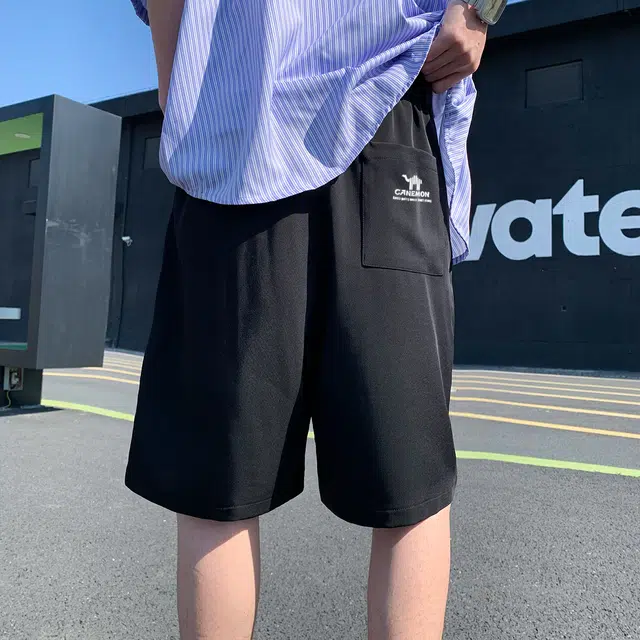 领航骆驼  美式高街潮牌纯色简约五角星柳钉小众设计感无性别主义户外通勤宽松舒适百搭五分直筒休闲   短裤 男女同款