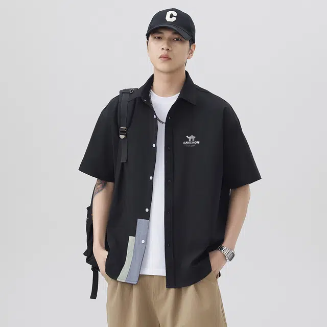 领航骆驼 港风设计色块拼接街头宽松百搭舒适休闲个性潮流透气户外通勤翻领短袖  衬衫 男女同款